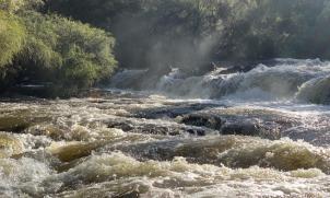 River rapids after the rain - sunshine and spray